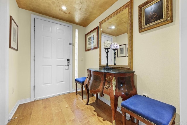 301 W G St Unit 119, San Diego, CA 92101 - entryway featuring light wood-style flooring and recessed lighting