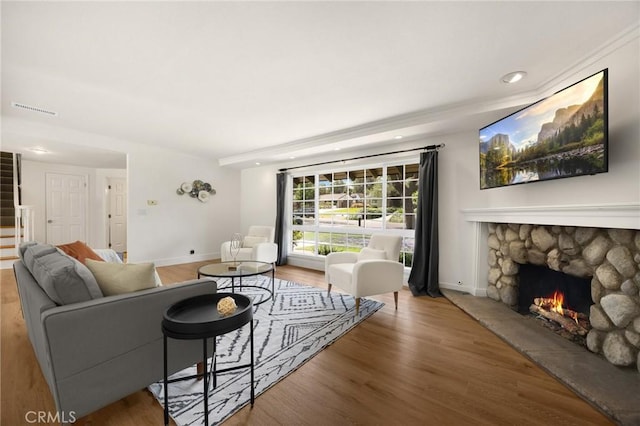 1345 W Valley View Dr, Fullerton, CA 92833 - living area featuring a fireplace, wood finished floors, stairs, and recessed lighting