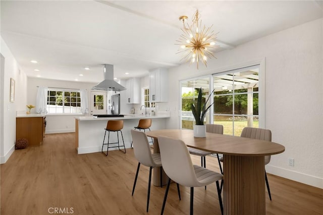 1345 W Valley View Dr, Fullerton, CA 92833 - dining room featuring a chandelier, light wood-style floors, and recessed lighting