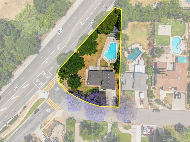 1345 W Valley View Dr, Fullerton, CA 92833 - aerial overview of property's location with a pool area and property boundaries highlighted