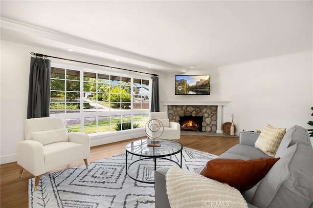 1345 W Valley View Dr, Fullerton, CA 92833 - living room featuring ornamental molding, recessed lighting, wood finished floors, and a stone fireplace