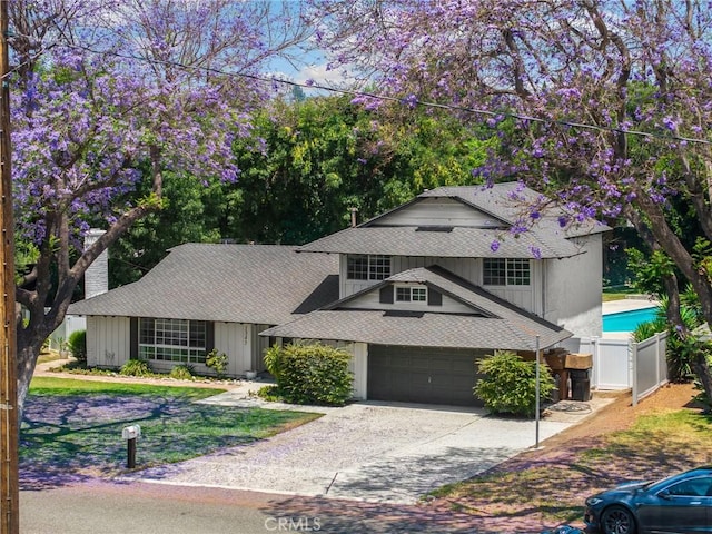 1345 W Valley View Dr, Fullerton, CA 92833 - view of front of house featuring roof with shingles, driveway, and a garage