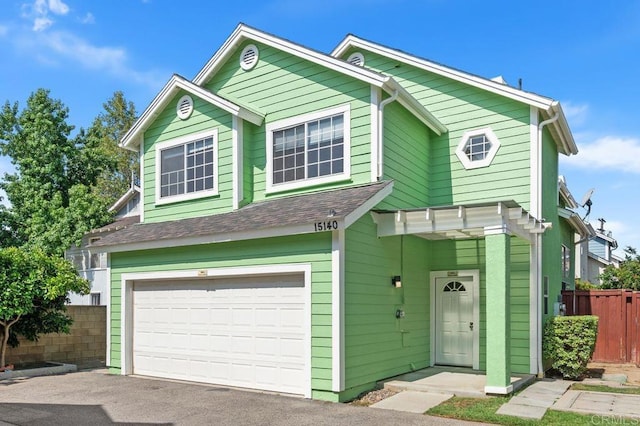 15140 Chase St, North Hills, CA 91343 - view of front of property with a garage, driveway, and a shingled roof
