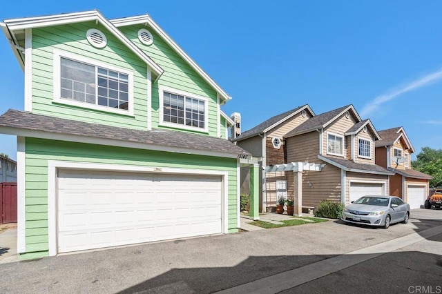 15140 Chase St, North Hills, CA 91343 - view of front facade featuring a garage