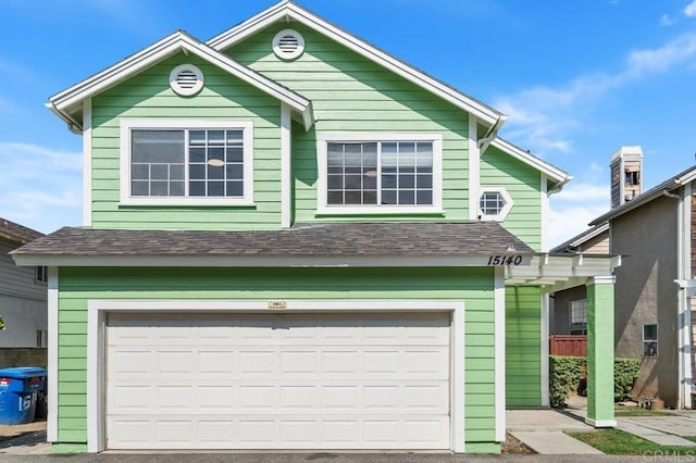 15140 Chase St, North Hills, CA 91343 - view of front facade featuring a garage and roof with shingles