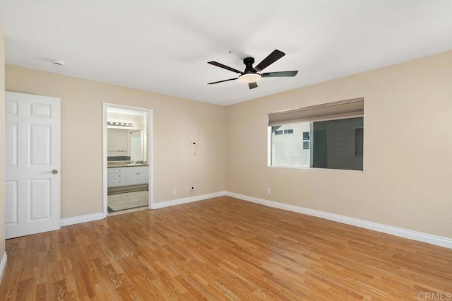 15140 Chase St, North Hills, CA 91343 - unfurnished bedroom with light wood-style floors, connected bathroom, and a ceiling fan