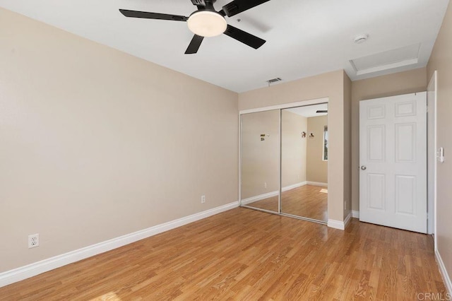 15140 Chase St, North Hills, CA 91343 - unfurnished bedroom with light wood finished floors, a closet, attic access, and ceiling fan