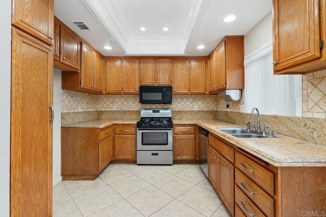 15140 Chase St, North Hills, CA 91343 - kitchen with stainless steel appliances, brown cabinets, a raised ceiling, light countertops, and ornamental molding