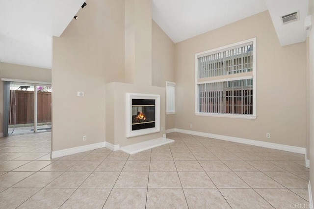 15140 Chase St, North Hills, CA 91343 - unfurnished living room with high vaulted ceiling, light tile patterned flooring, and a multi sided fireplace