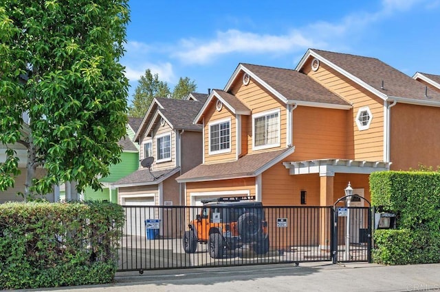 15140 Chase St, North Hills, CA 91343 - view of front of home featuring a garage, a fenced front yard, a shingled roof, a gate, and driveway