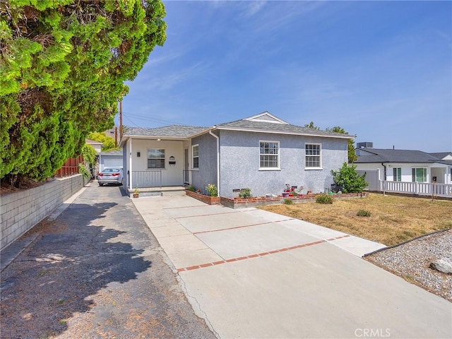 2724 Scott Rd, Burbank, CA 91504 - view of front of house with stucco siding and driveway