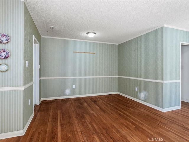 2724 Scott Rd, Burbank, CA 91504 - spare room featuring wood finished floors, crown molding, a textured ceiling, and wallpapered walls