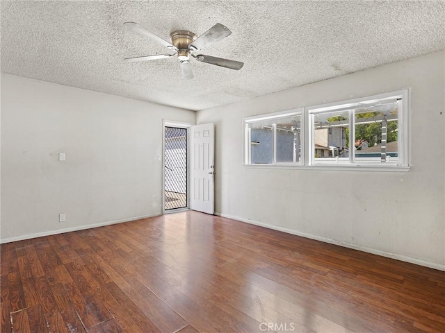 2724 Scott Rd, Burbank, CA 91504 - empty room with wood finished floors, a ceiling fan, healthy amount of natural light, and a textured ceiling