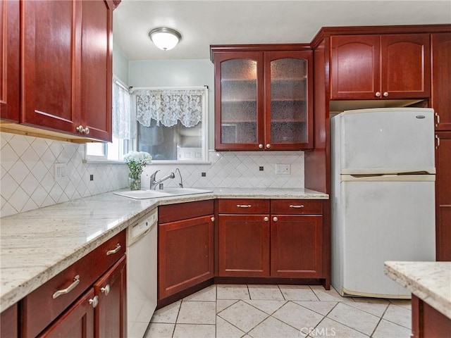 2724 Scott Rd, Burbank, CA 91504 - kitchen featuring white appliances, dark brown cabinets, decorative backsplash, and light tile patterned floors