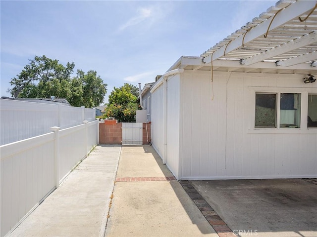 2724 Scott Rd, Burbank, CA 91504 - view of property exterior featuring a pergola, a patio area, and a gate