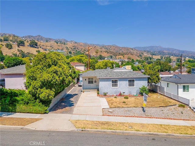 2724 Scott Rd, Burbank, CA 91504 - bungalow-style home with a mountain view, concrete driveway, and stucco siding