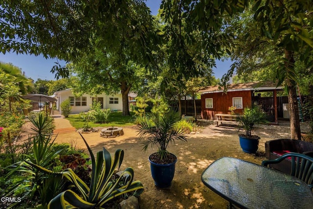 216 N Fulton St, Ojai, CA 93023 - view of yard featuring a fire pit and a patio
