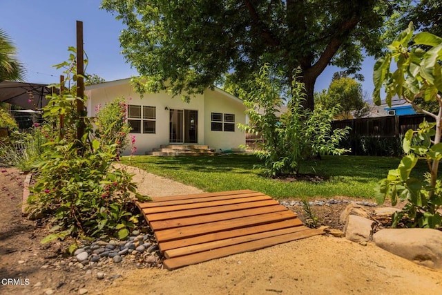 216 N Fulton St, Ojai, CA 93023 - rear view of property with stucco siding