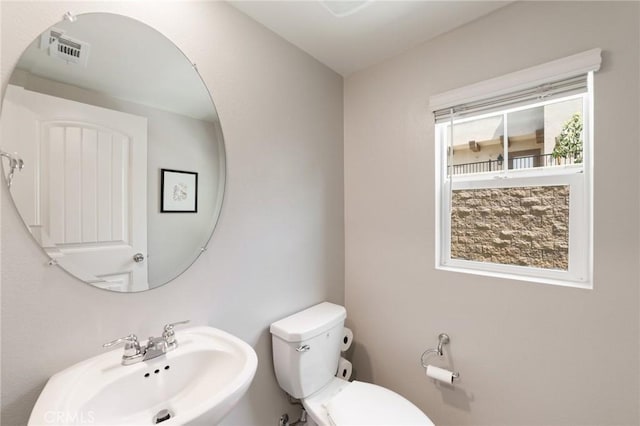 16502 Casa Grande Ave Unit 318, Fontana, CA 92336 - half bath featuring a sink and toilet