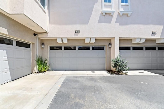 16502 Casa Grande Ave Unit 318, Fontana, CA 92336 - garage featuring concrete driveway