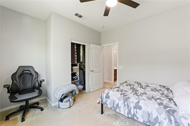 16502 Casa Grande Ave Unit 318, Fontana, CA 92336 - bedroom with light carpet, a closet, and a ceiling fan