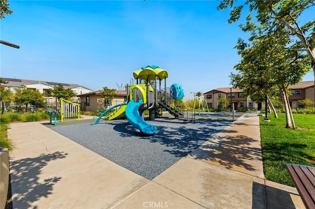 16502 Casa Grande Ave Unit 318, Fontana, CA 92336 - community jungle gym featuring a residential view