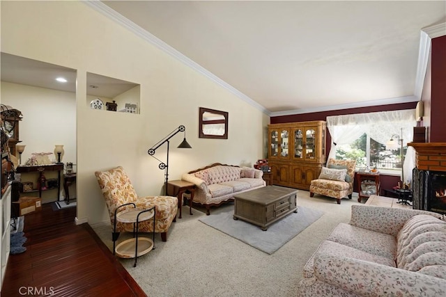 5647 Redwood Ave, Palmdale, CA 93551 - living room with a lit fireplace, lofted ceiling, crown molding, and wood finished floors