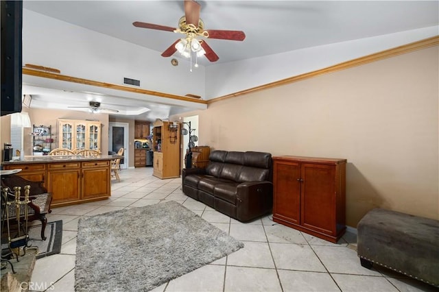 5647 Redwood Ave, Palmdale, CA 93551 - living area with a ceiling fan, light tile patterned floors, and high vaulted ceiling