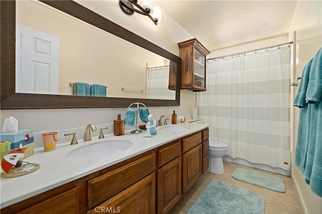 5647 Redwood Ave, Palmdale, CA 93551 - full bath featuring double vanity, curtained shower, and tile patterned floors