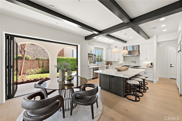6 Rickie, Ladera Ranch, CA 92694 - dining space with light wood-style floors, beam ceiling, and recessed lighting