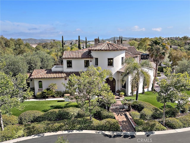 6 Rickie, Ladera Ranch, CA 92694 - mediterranean / spanish house with a tile roof, stucco siding, and a front yard