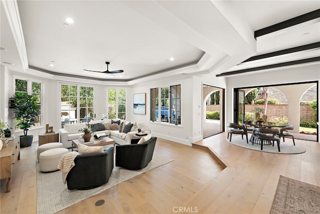 6 Rickie, Ladera Ranch, CA 92694 - living area with a tray ceiling, light wood-type flooring, ceiling fan, recessed lighting, and crown molding