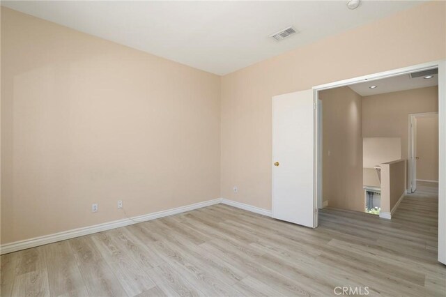 27861 Crown Court Cir Unit 72, Valencia, CA 91354 - spare room featuring wood finished floors and baseboards