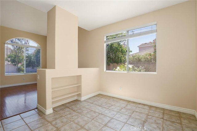 27861 Crown Court Cir Unit 72, Valencia, CA 91354 - spare room with built in features and light tile patterned floors
