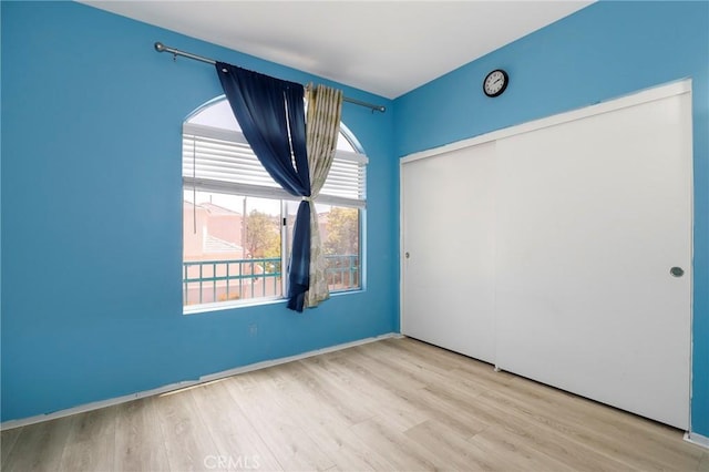 27861 Crown Court Cir Unit 72, Valencia, CA 91354 - unfurnished room with wood finished floors