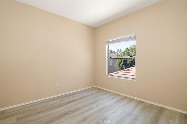 27861 Crown Court Cir Unit 72, Valencia, CA 91354 - unfurnished room with light wood-style flooring and baseboards