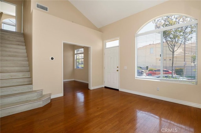 27861 Crown Court Cir Unit 72, Valencia, CA 91354 - foyer featuring stairway, wood finished floors, and lofted ceiling