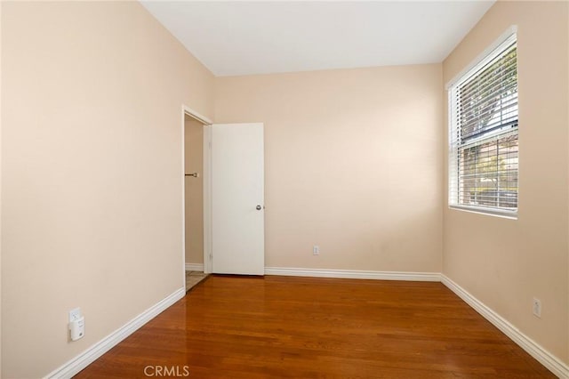 27861 Crown Court Cir Unit 72, Valencia, CA 91354 - unfurnished room featuring plenty of natural light and wood finished floors