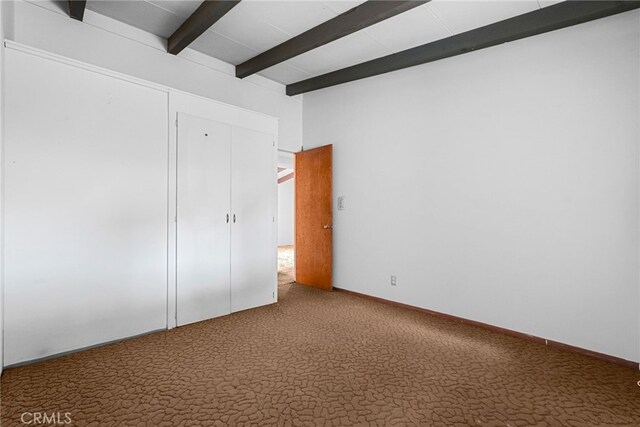 27439 Santa Clarita Rd, Saugus, CA 91350 - unfurnished bedroom featuring beam ceiling, carpet flooring, and a closet