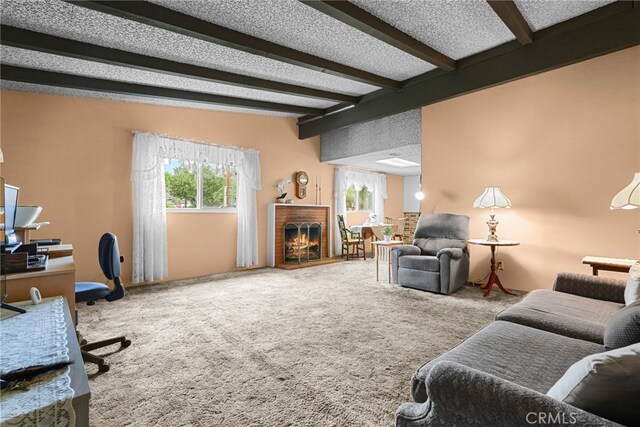 27439 Santa Clarita Rd, Saugus, CA 91350 - carpeted living room with beamed ceiling, plenty of natural light, a brick fireplace, and a desk