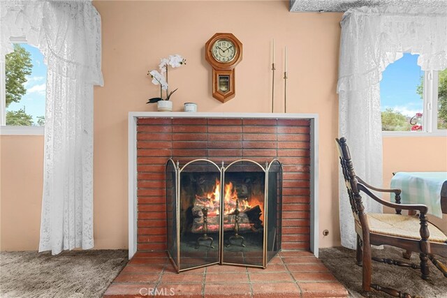 27439 Santa Clarita Rd, Saugus, CA 91350 - detailed view of a brick fireplace and carpet