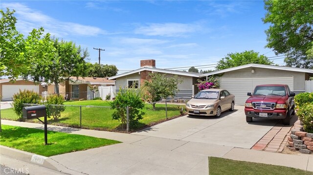 27439 Santa Clarita Rd, Saugus, CA 91350 - view of front facade featuring a chimney, driveway, and an attached garage