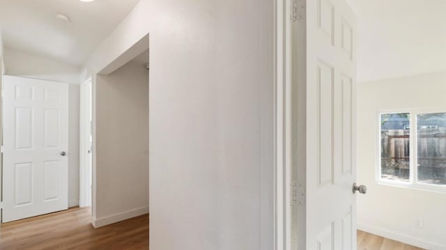 846 44th St, San Diego, CA 92102 - corridor featuring wood finished floors and lofted ceiling