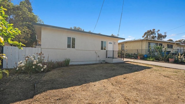 846 44th St, San Diego, CA 92102 - rear view of house with stucco siding