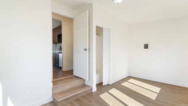 846 44th St, San Diego, CA 92102 - unfurnished room with light wood finished floors and baseboards