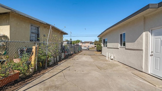 846 44th St, San Diego, CA 92102 - view of side of property featuring stucco siding and a patio area
