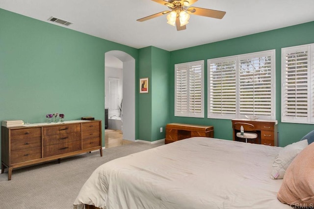 1488 Enchante, Oceanside, CA 92056 - bedroom with arched walkways, carpet flooring, and a ceiling fan