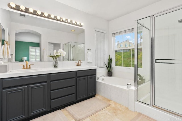1488 Enchante, Oceanside, CA 92056 - bathroom featuring a stall shower, double vanity, a garden tub, and tile patterned flooring