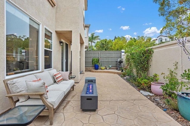 1488 Enchante, Oceanside, CA 92056 - fenced backyard featuring a patio and an outdoor living space with a fire pit