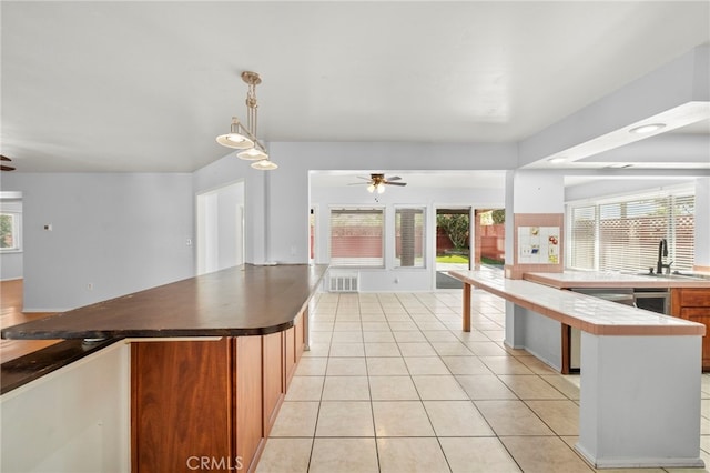 25925 Roanoke Rd, Menifee, CA 92586 - kitchen with ceiling fan, open floor plan, and light tile patterned floors
